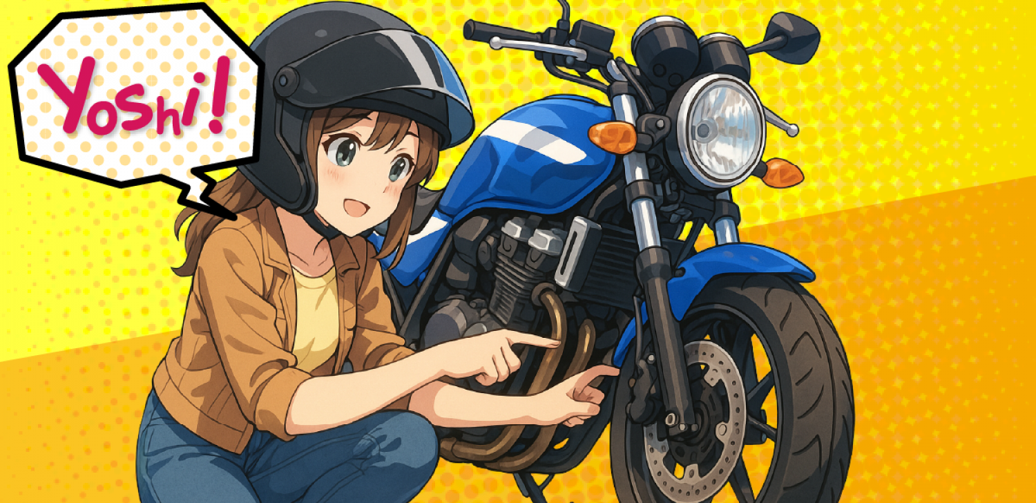 オートバイのタイヤを点検するライダー
